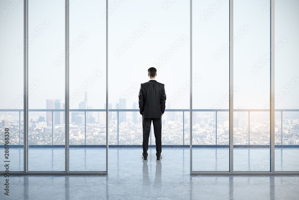 Businessman in contemporary office interior