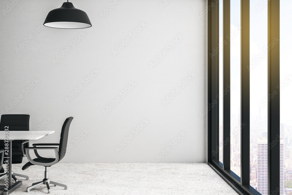 Modern conference room with city view, light wall and concrete floor.