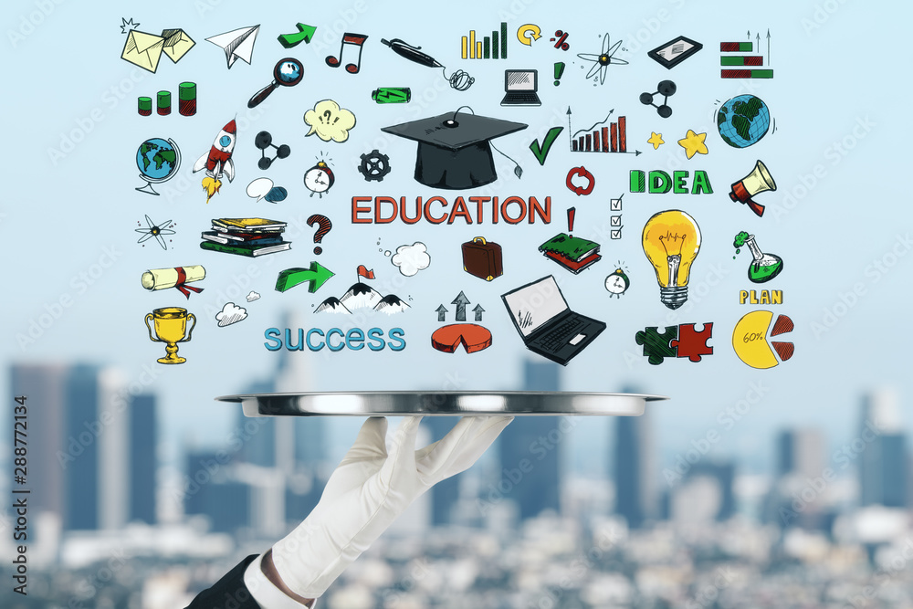 Education concept with hand drawn symbols and words above waiters hand with tray.