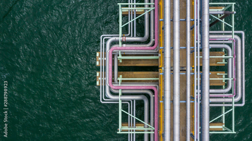 Aerial top view gas and oil pipe line in the ocean.