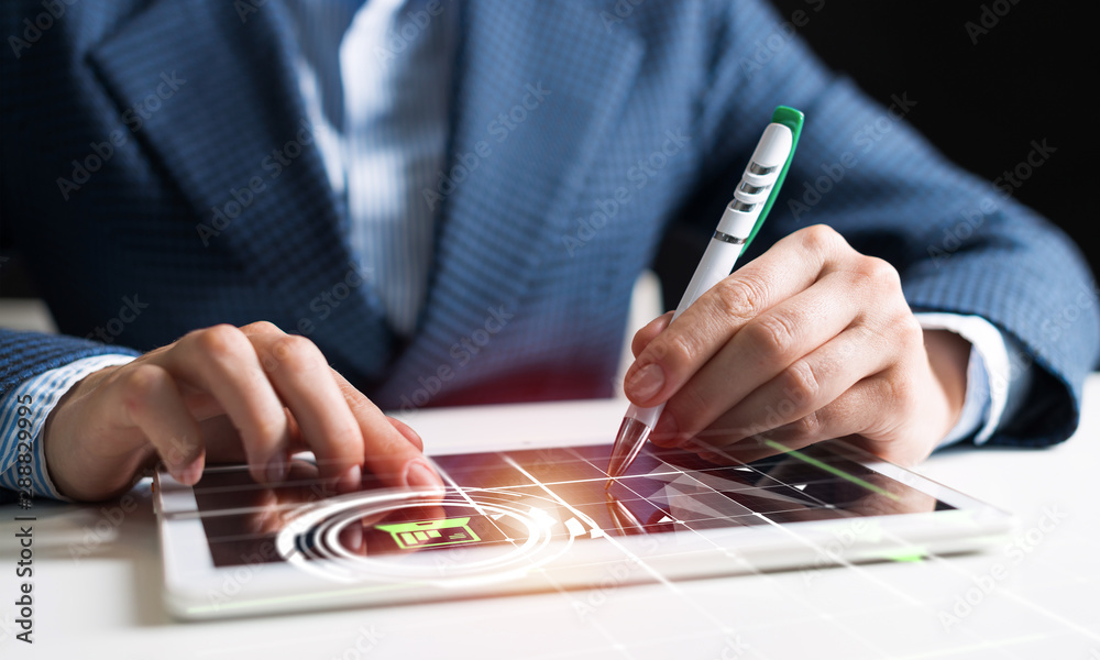 Businessman hands using tablet computer