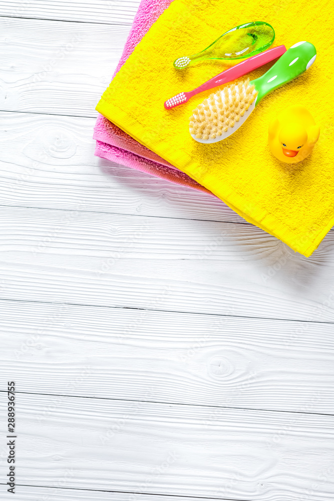 baby accessories for bath on wooden background