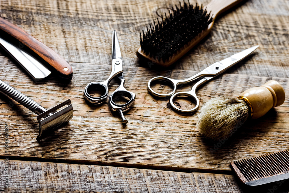 Tools for cutting beard barbershop on wooden background