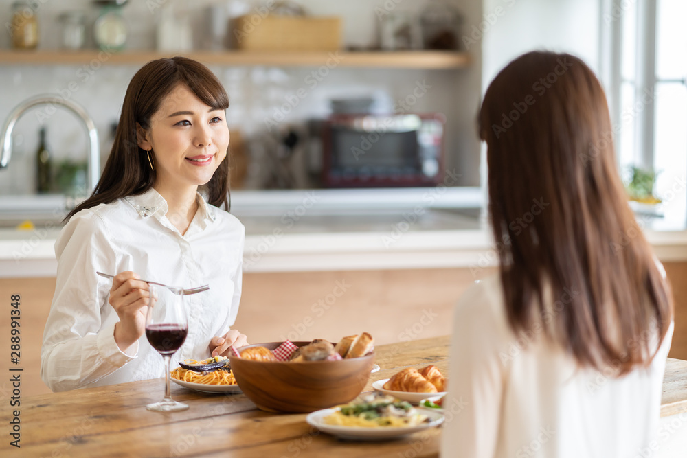 attractive asian women having lanch in dining