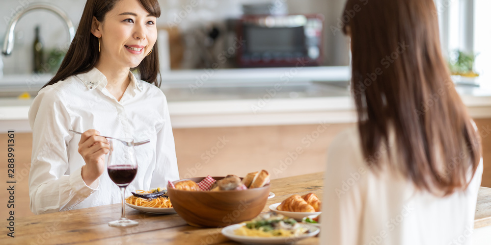 attractive asian women having lanch in dining