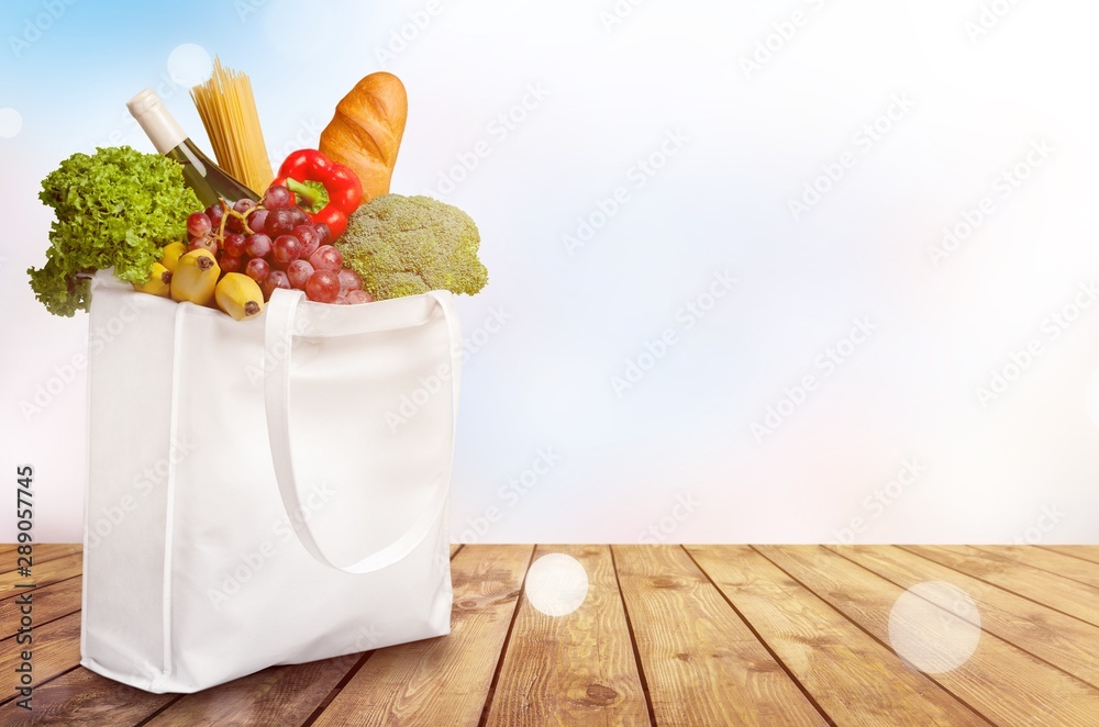 Full shopping  bag, isolated over  background