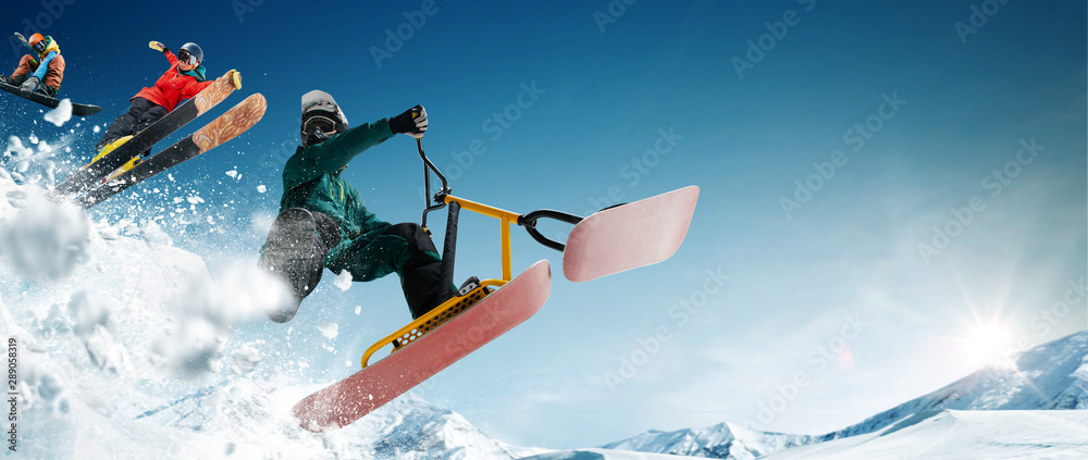 Skiing, snow scoot, snowboarding.  Extreme winter sports.