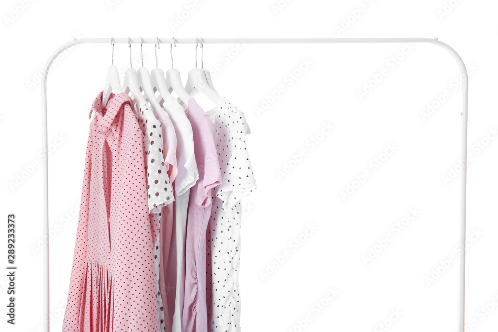 Rack with hanging clothes on white background