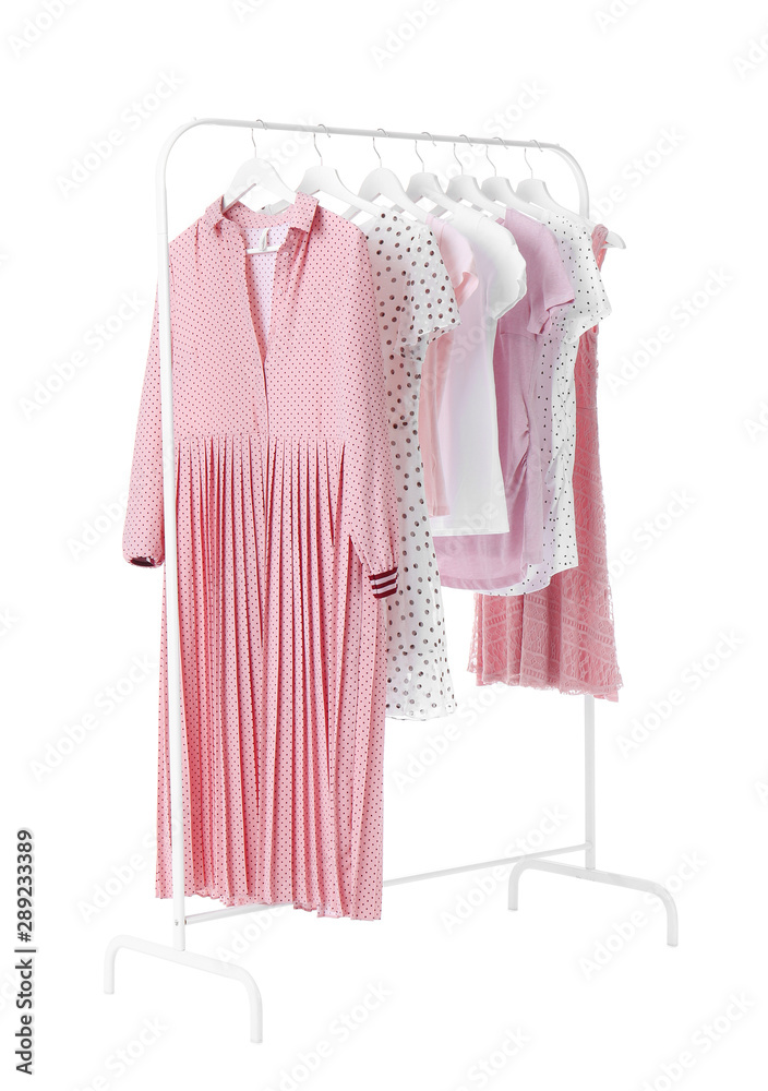 Rack with hanging clothes on white background