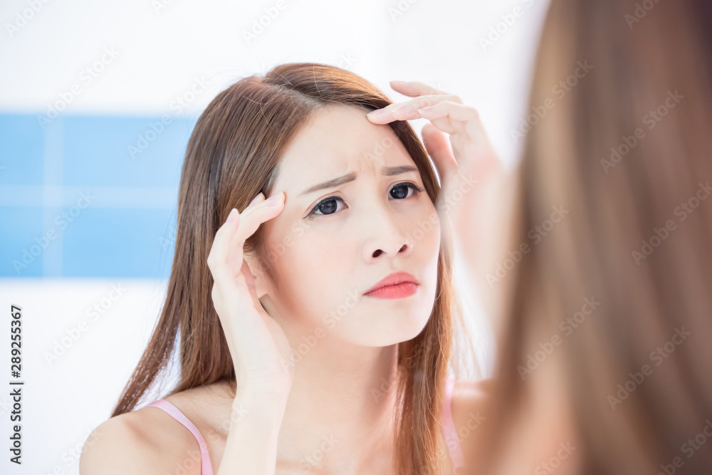 woman worry forehead wrinkles