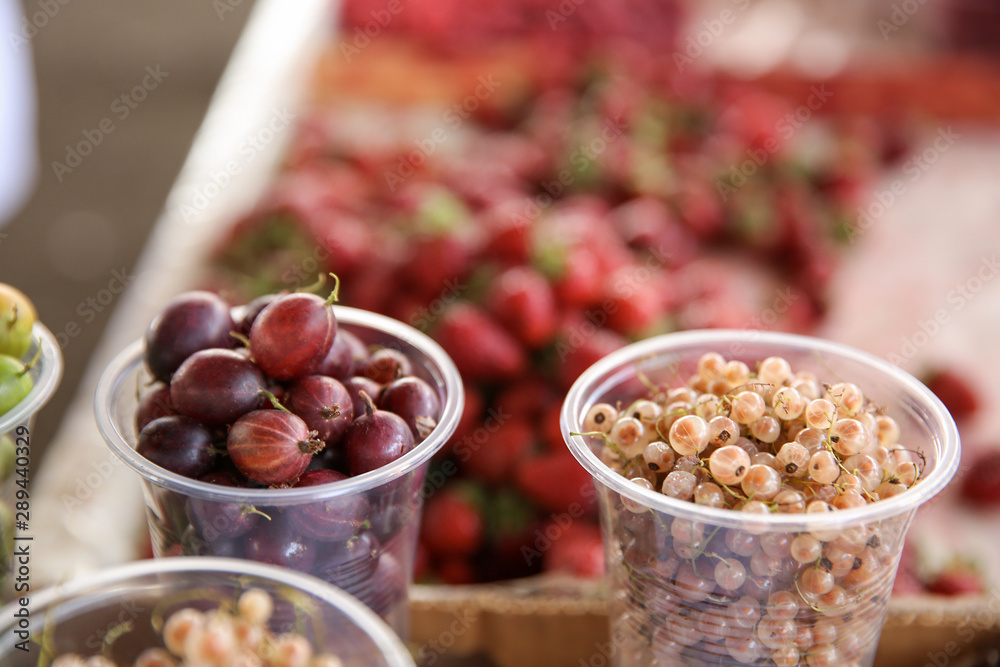 Assortment of fresh berries on counter at market