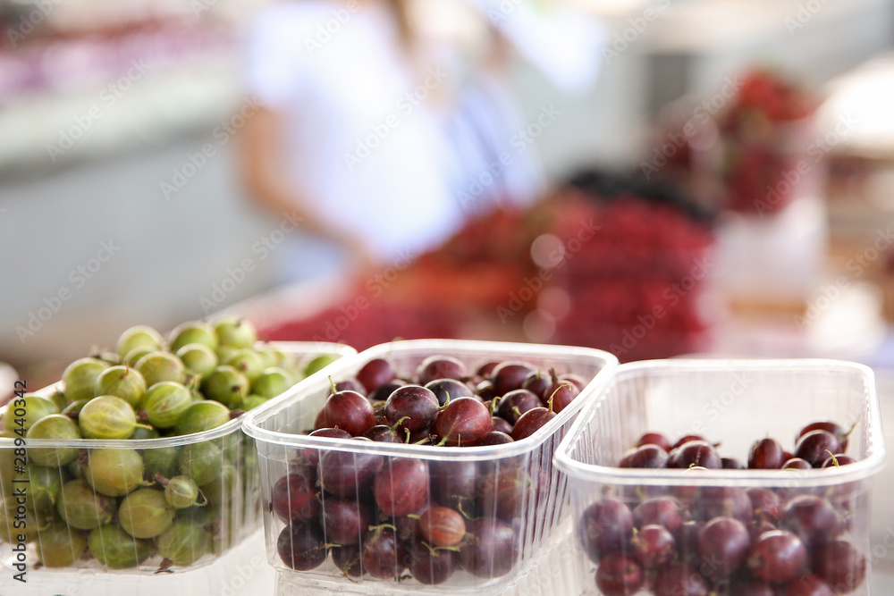 Fresh gooseberry on counter at market