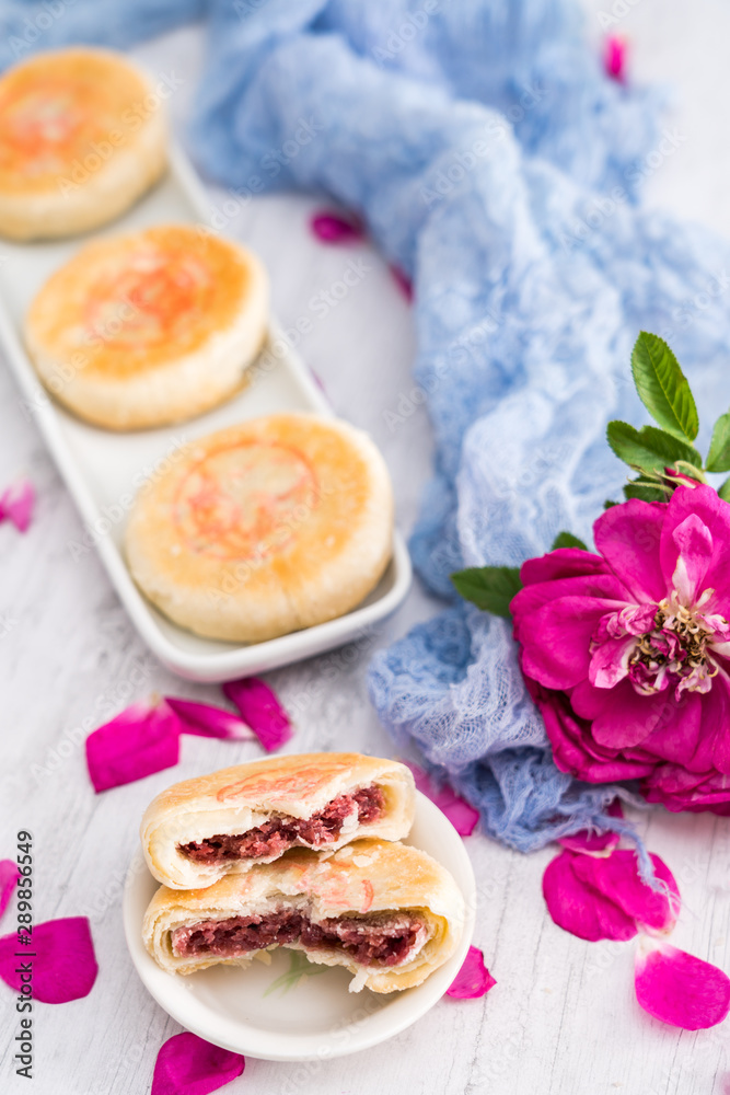 Fresh flower cake of Yunnan, China on the cutting board 