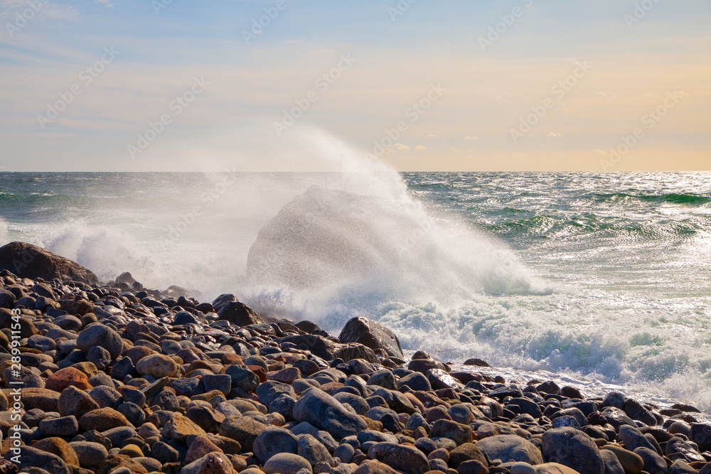 Large waves hit a rocky coastline in Norway