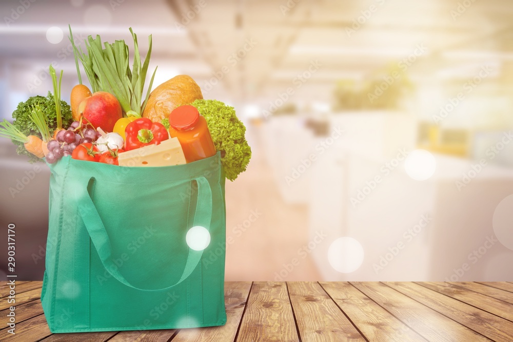 Full shopping  bag, isolated over  background