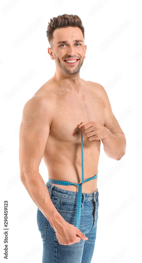 Handsome muscular man with measuring tape on white background. Weight loss concept