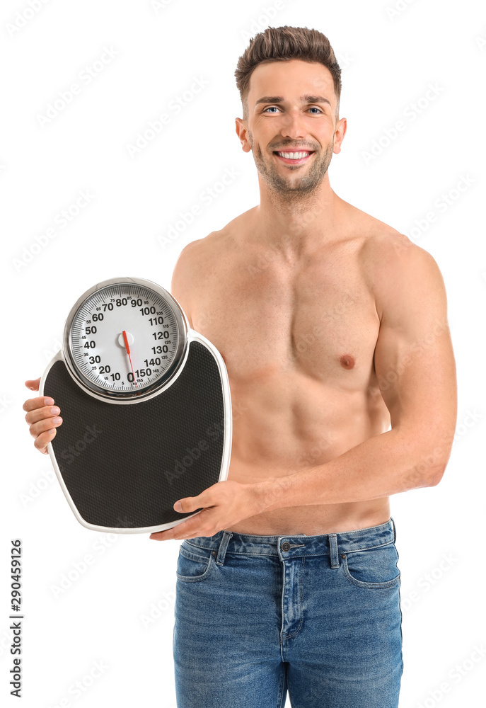 Handsome muscular man with scales on white background. Weight loss concept