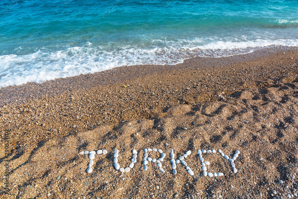 Turkey sign on the beach made from small rocks. Vacations concept