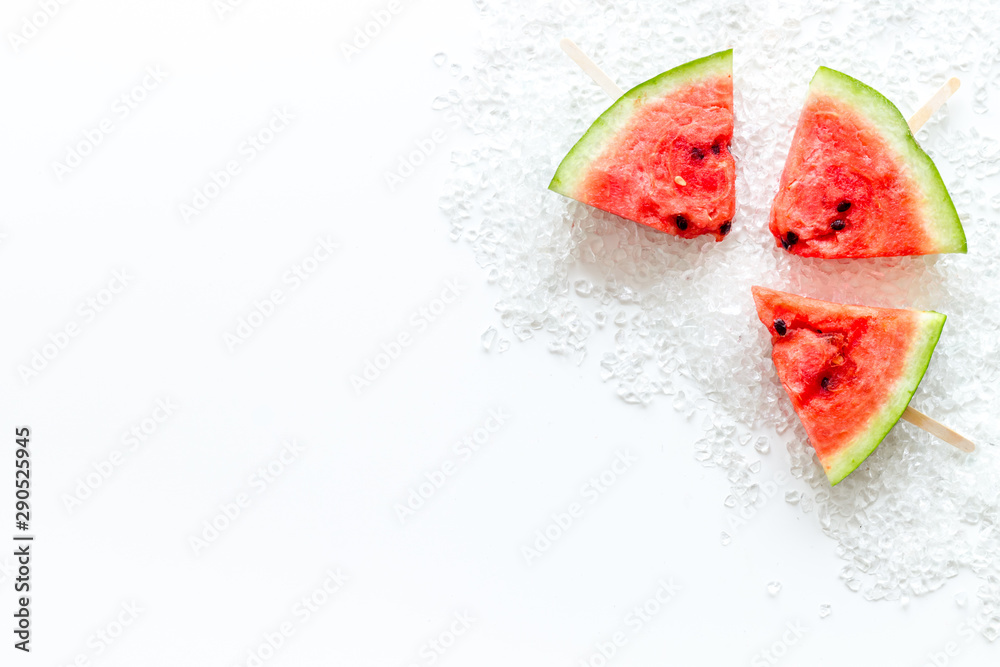 Slices of watermelon popsicle on white background top view mock up