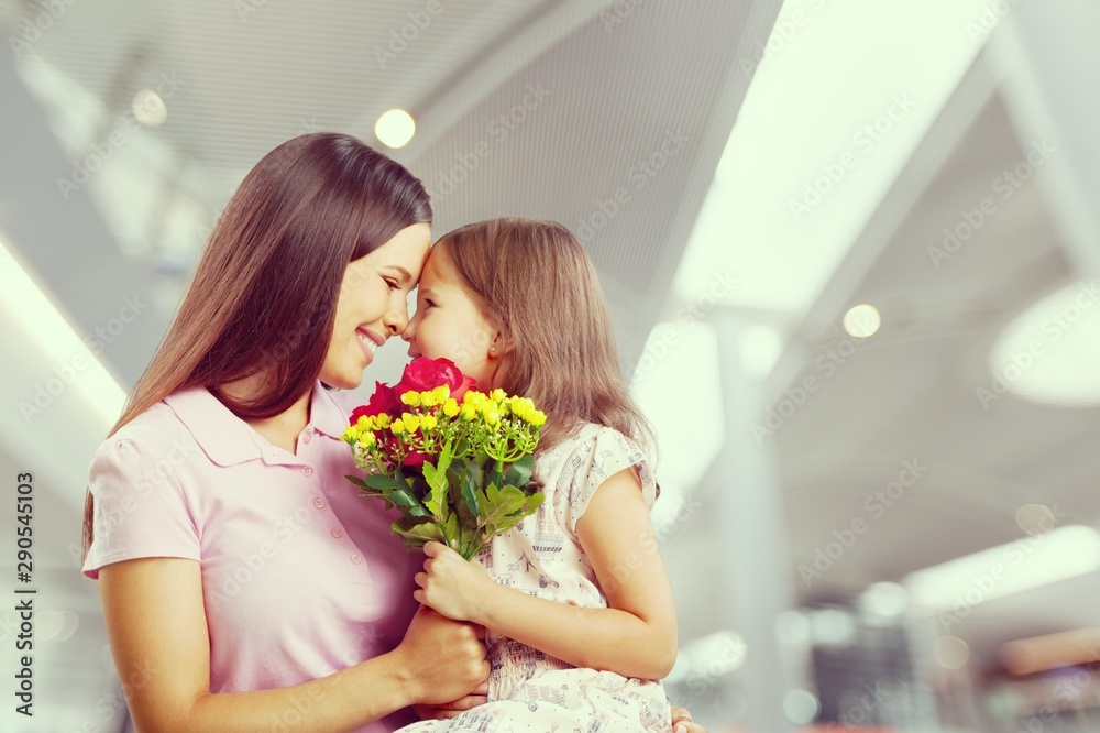 Happy Mother and daughter hugging