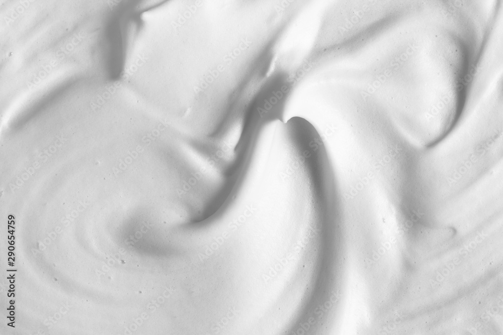 White cleanser foam texture background. Cosmetic mousse, foamy soap, shampoo suds, skin care backgro