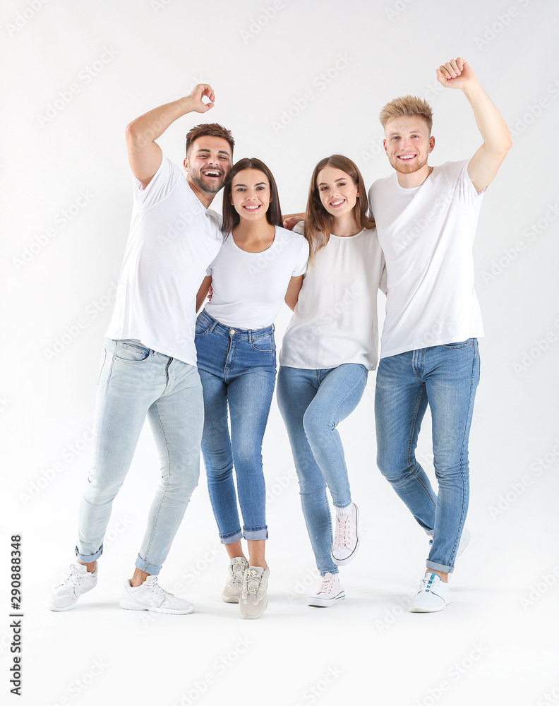 Group of young people in stylish casual clothes on white background