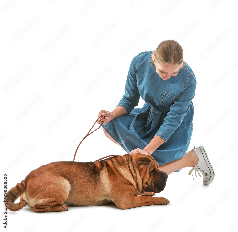 Happy woman with cute dog on white background