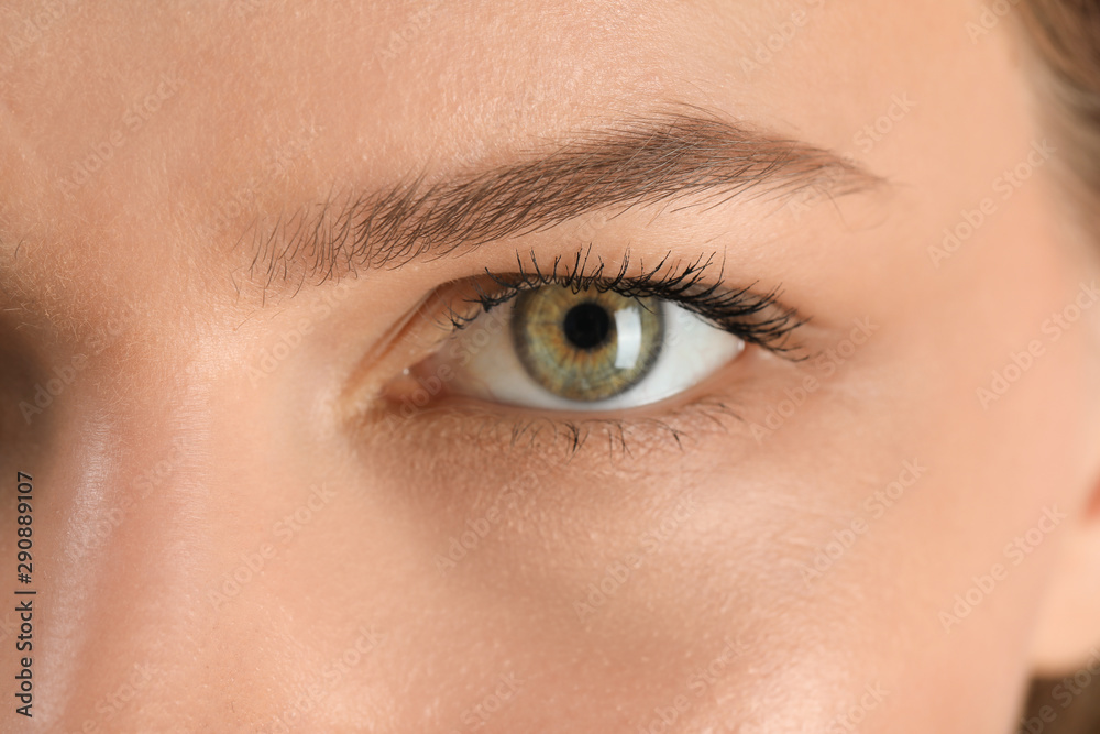 Young woman with beautiful eyebrows, closeup