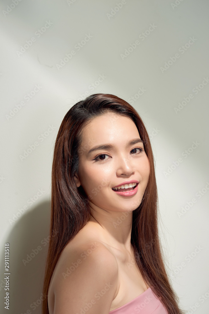 Beauty asian girl with long and shiny hair . Beautiful model woman with long hairstyle. Care and bea