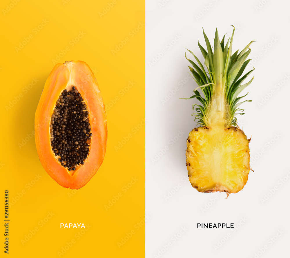 Creative layout made of papaya and pineapple. Flat lay. Food concept.