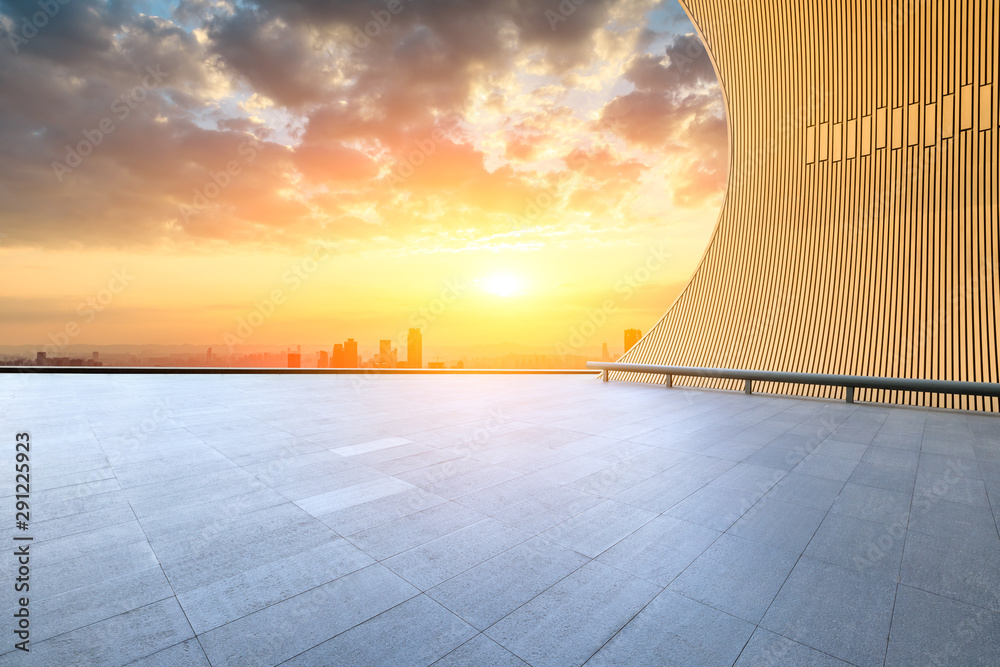 Chongqing skyline and modern buildings with empty square floor at sunset,high angle view.