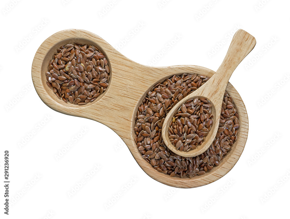 Flaxseed or linseed in wooden spoon on the wooden tray isolated on white background.Herb, cereal. To