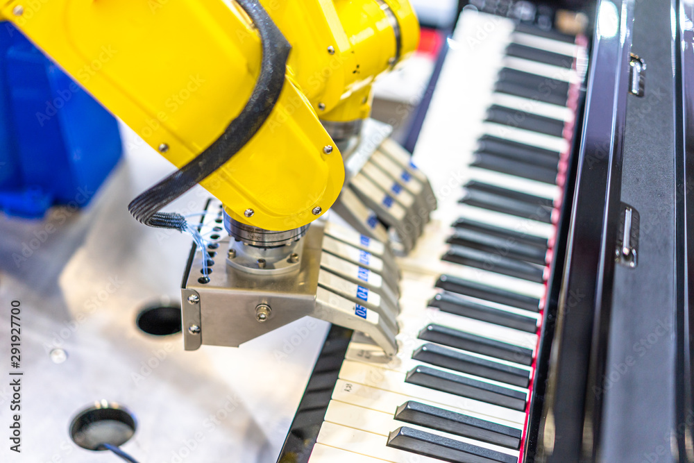 robot playing piano