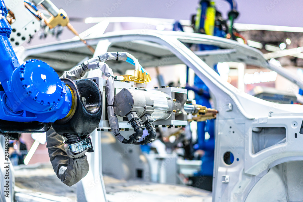 robot arm working in car factory