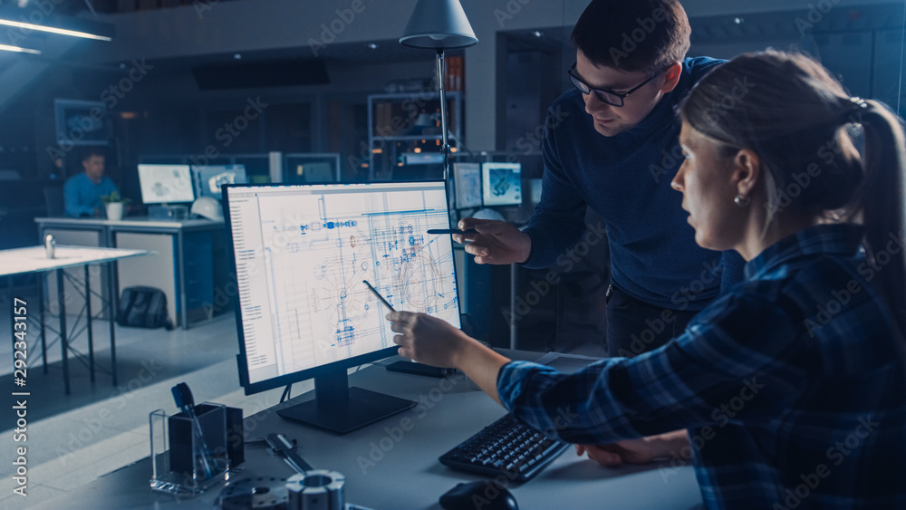 Engineer Working on Desktop Computer, Screen Showing CAD Software with Technical Blueprints, Her Mal