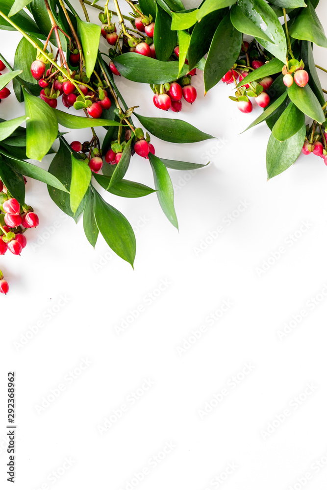 Summer pattern with green plants and red berries on white background top view mockup