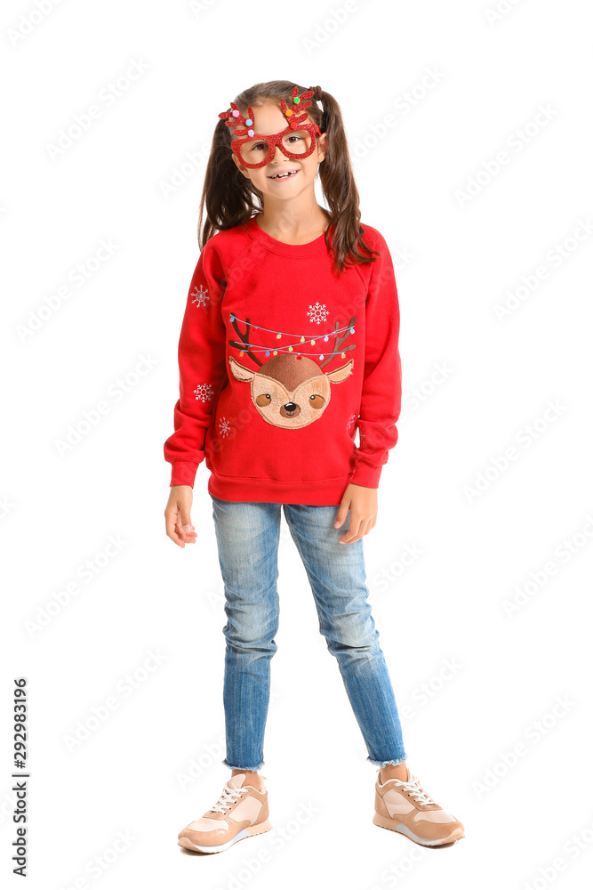 Little girl in Christmas sweater on white background