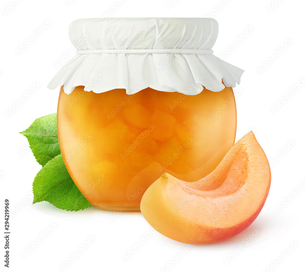 Isolated jam jar. Apricot home made jam in glass container with paper lid isolated on white backgrou