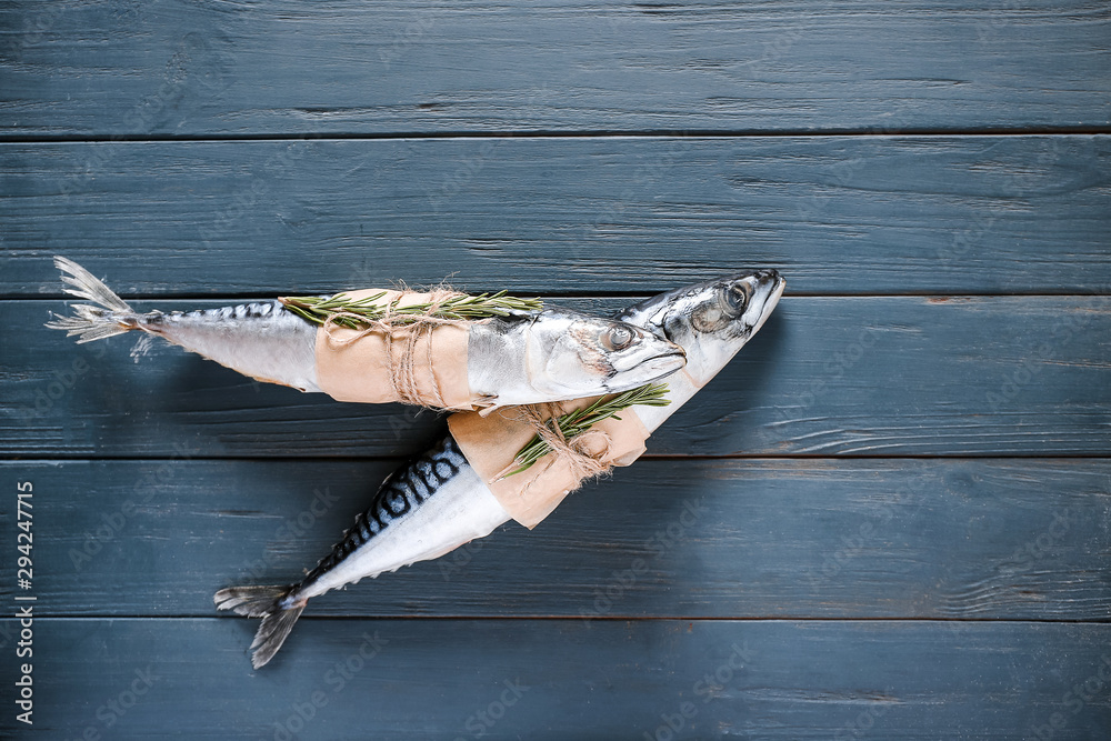 Fresh mackerel fish on wooden table