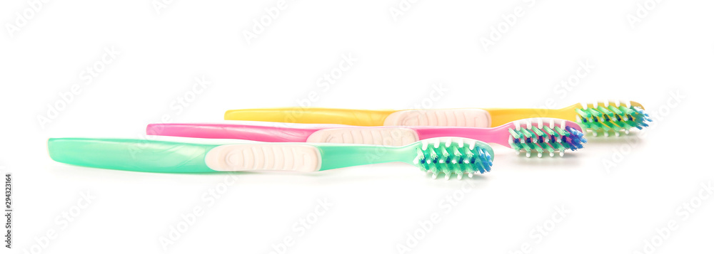 Tooth brushes on white background