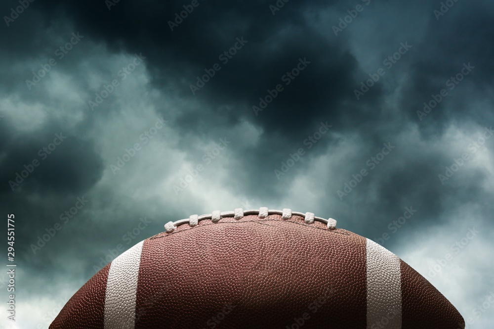 American football ball on background