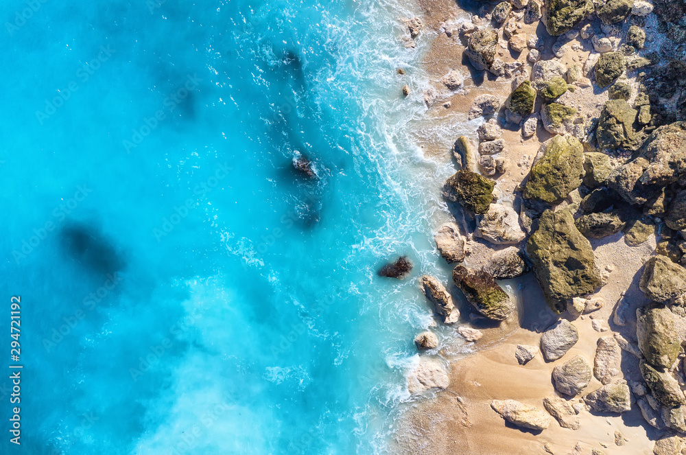 Coast as a background from top view. Turquoise water background from top view. Summer seascape from 