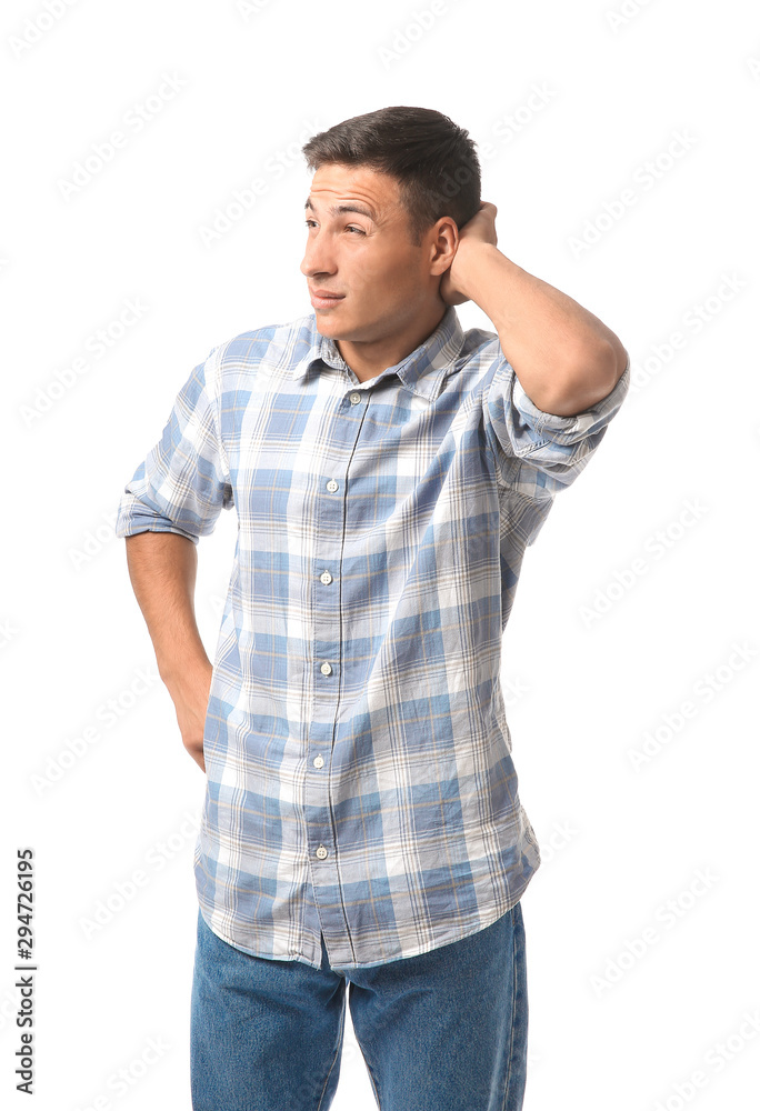 Portrait of thoughtful young man on white background