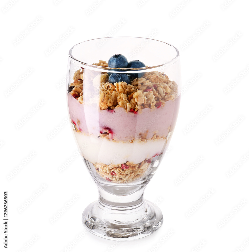 Dessert with blueberry and oat flakes in glass on white background