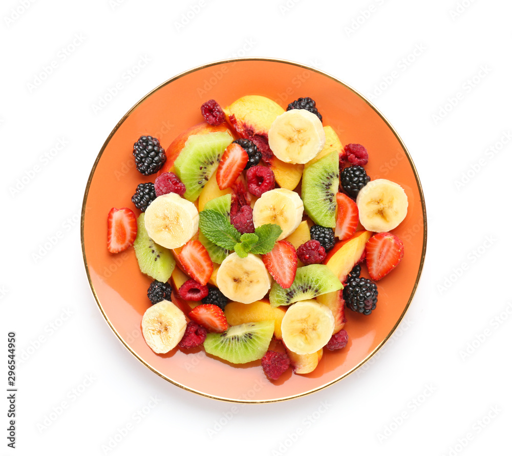 Plate with tasty fruit salad on white background