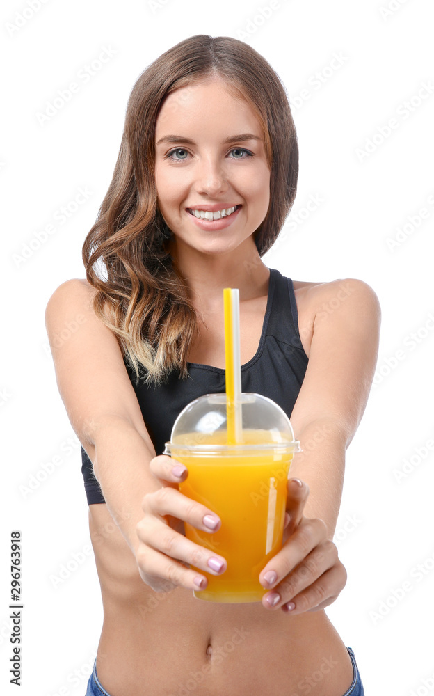 Beautiful young woman with orange juice on white background