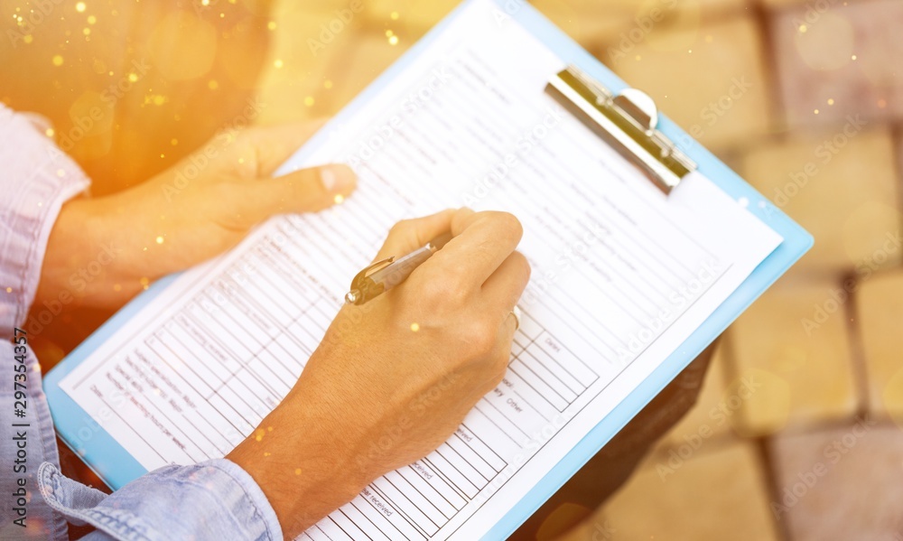 Closeup of a Person Filling a Track Record