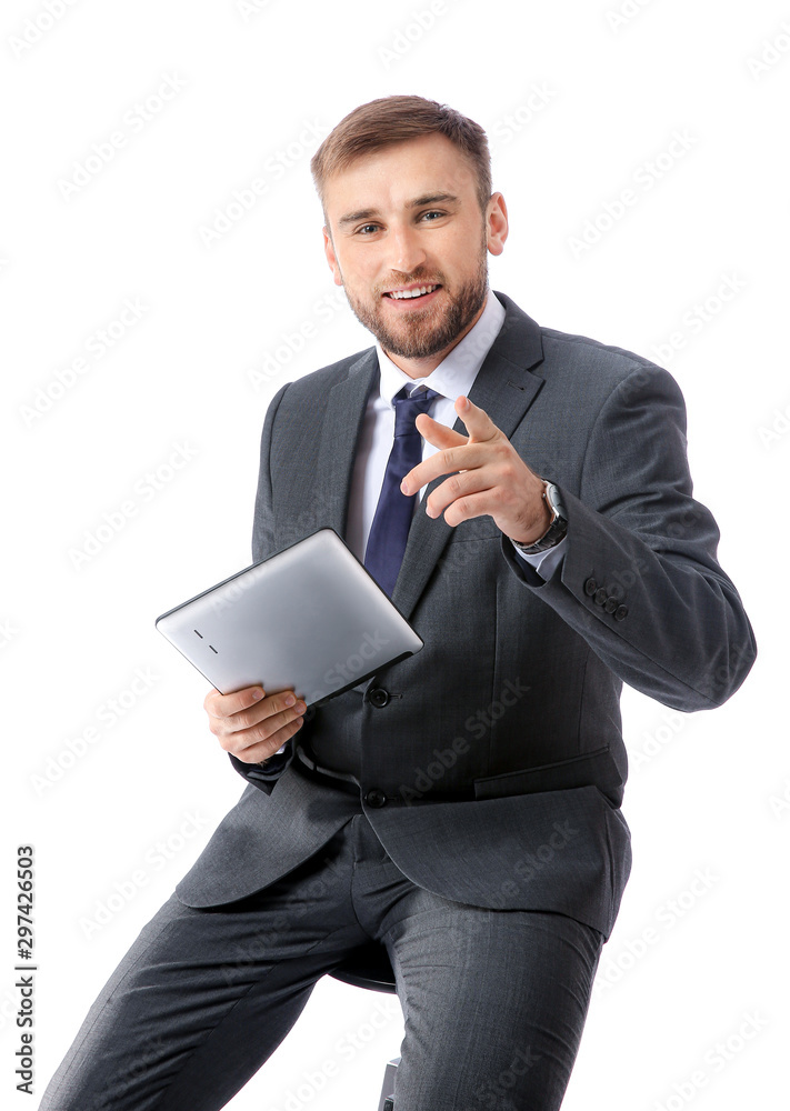 Portrait of handsome businessman with tablet computer on white background