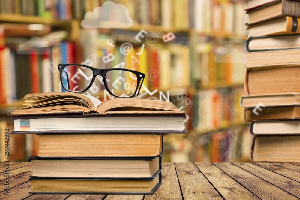 Books on  table  background,close up