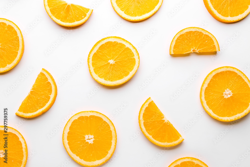 Fresh orange slices on white background